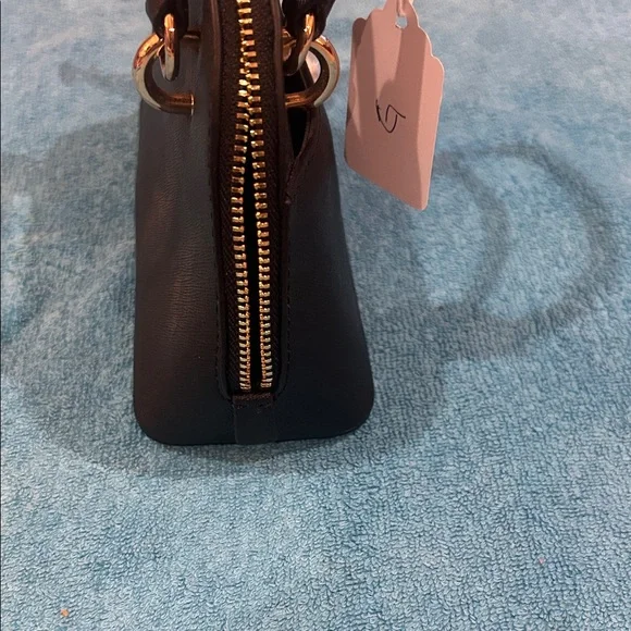 Michael Kors Black Mini Bag with Gold Details - Picture 7 of 10